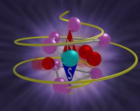 Chiral phonons excited by the circularly polarized terahertz light pulses generate ultrafast magnetization in cerium fluoride. Fluorine ions (red, fuchsia) are set into motion by circularly polarized terahertz light pulses (yellow spiral), where red denotes the ions with the largest motion in the chiral phonon mode. The cerium ion is represented in teal. The compass needle represents the magnetization induced by the rotating atoms. Image courtesy of Mario Norton and Jiaming Luo/Rice University.