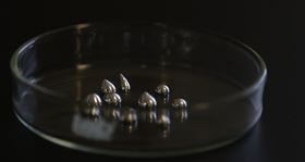 Liquid gallium in a Petri dish. Photo: University of Sydney/Philip Ritchie.