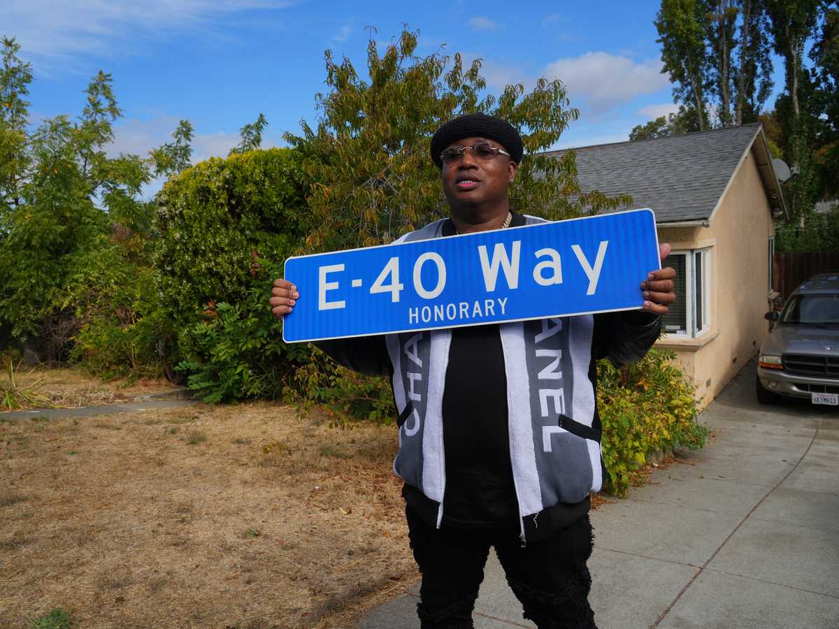 E-40 in front of his childhood home