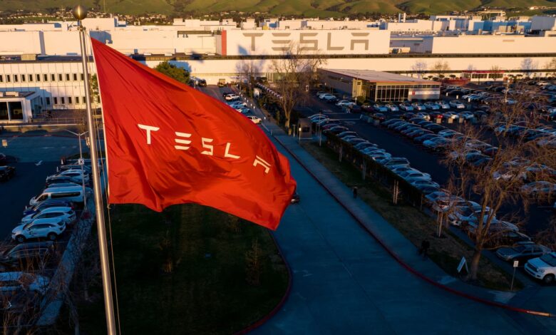 Tesla raising factory worker pay in U.S., as UAW aims to organize