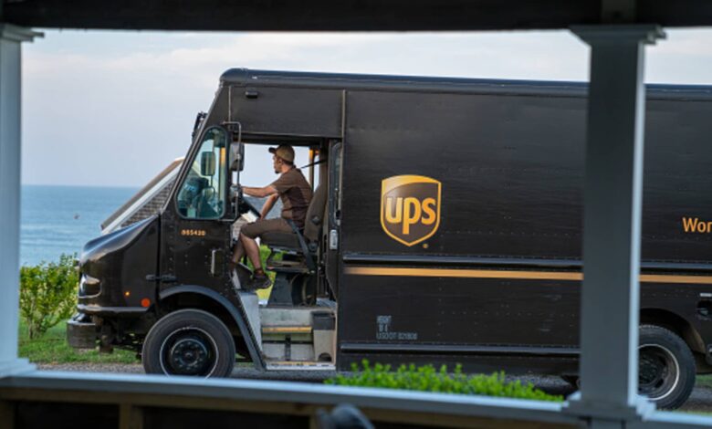 UPS announces 12,000 job cuts; reports drop in package volume